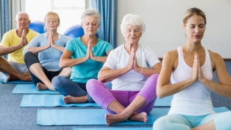 seniors participating in meditation for health benefits