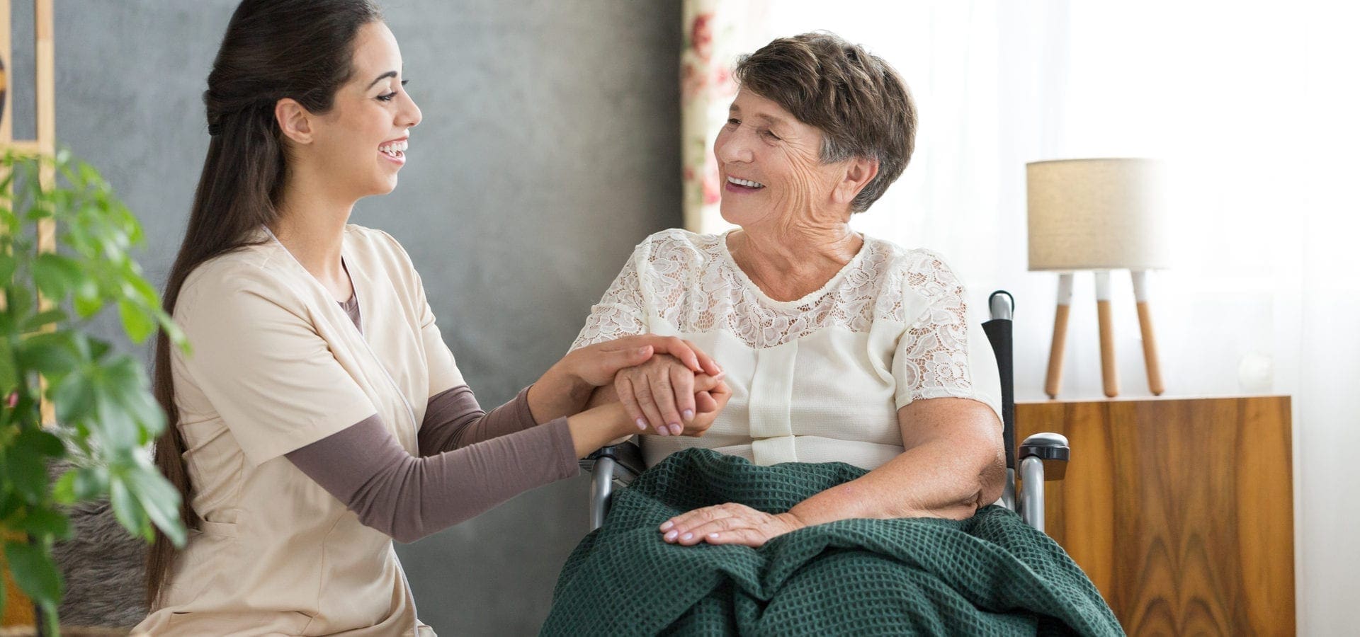 Senior sitting with caregiver to prepare for their time together